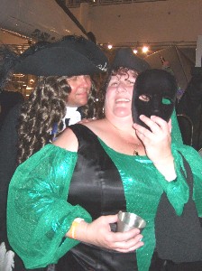 Silkie McDonough holding a mask up to her face