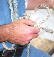 Close up of partially tied knot