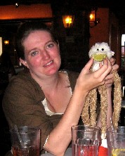 Kate holding a lime over Lob's face