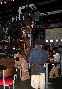 Michael on the bar during the announcement of the raffle winner