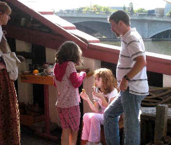 People ministering to a green girl