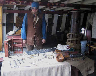 Mission in sunglasses with his surgical gear