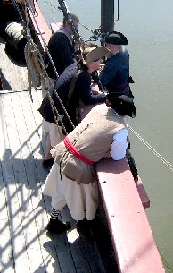 Pirate looking over the side as Mark works