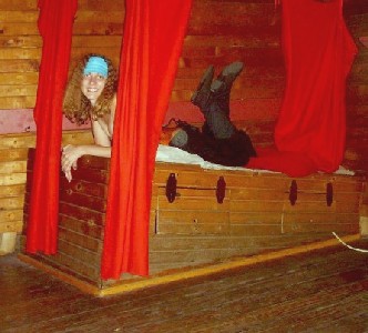 Rosabella lying on the captain's bed