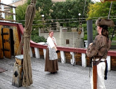 Kate sword fighting with Sam