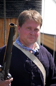 Tom, pirate with a gun