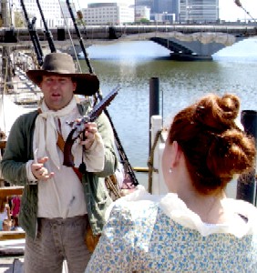 Michael explaining weapons