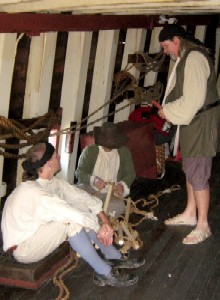 Michael making the ladder while Sam and Iron Jon watch