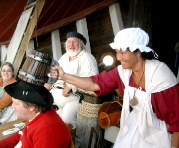 Paula hitting Jay with the attack mug