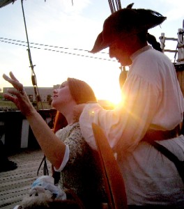 Shay plaiting Jess' locks
