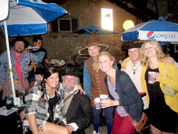 Girls posing with the pirates at the restaurant