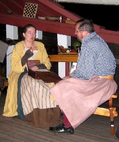 Kate writing something for Dan