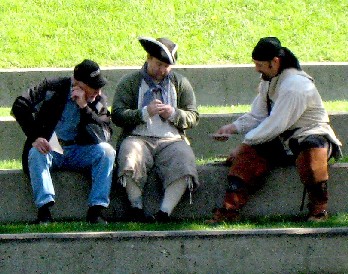 Michael & Shannon roll cartridges while some guy watches