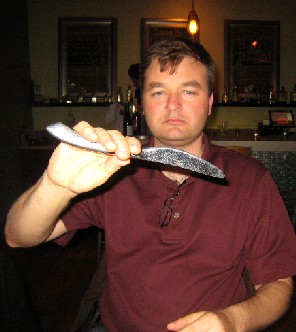 Michael makes his napkin into a rabbit