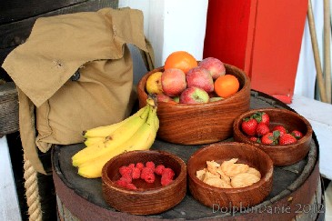 Fruit atop a barrel