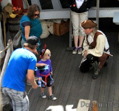 Dennis entertaining a group