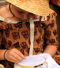 Elizabeth embroidering