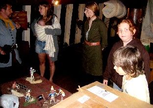 People talking around models