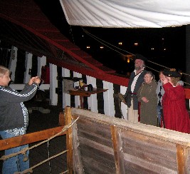 Mark and Jennie pose with tourists