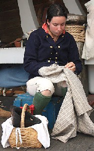 Andrew sewing Michael's underwear