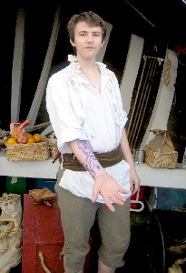 Andrew Thatcher shows off his tattoo