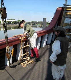 Michael and Grace placing the ladder over the side 2