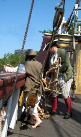 Michael and Grace placing the ladder over the side 3