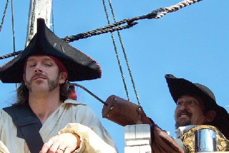 Shannon piercing Jim's ear