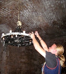 Wendy lighting the candelabra candles