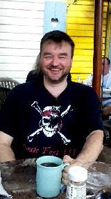 Mission sitting at the table laughing