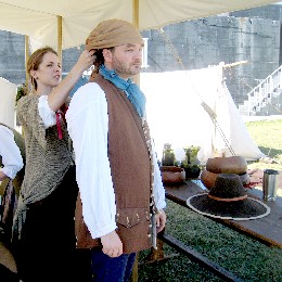 Mae ties Mission's Head Scarf on