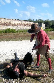 Mission offers the clyster syringe to Captain Black