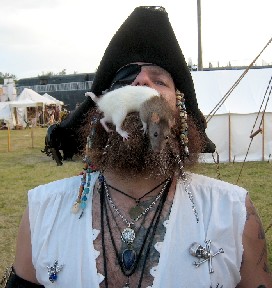 Redbeard with his rat in his mouth