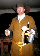 Lob holding on to Michael's wine bottle