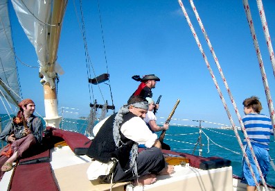 Kid Looking at Pirates and Guns