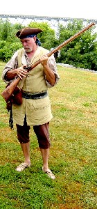 Palmetto looks at his gun