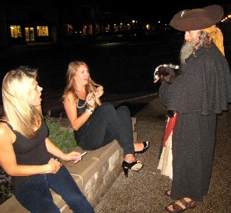 Billie scares two blondes with the skunk puppet