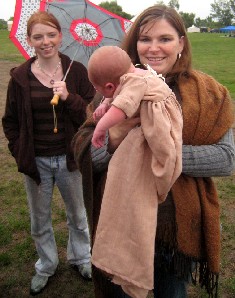 Trudi and her new born son in garb