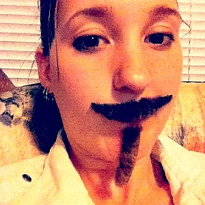 Amanda with beard and mustache