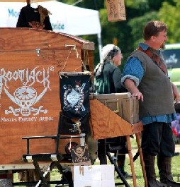 The Captain at his booth