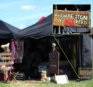 Vendor with skulls and sign