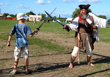 MD teaching kid to sword fight