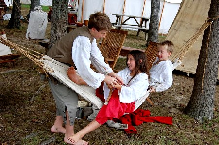 Thatcher kids fighting in the hammock