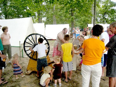 John draws a crowd while making rope