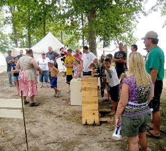 John explaning ropemaking to the crowd