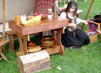 Trish putting a new popper on her whip