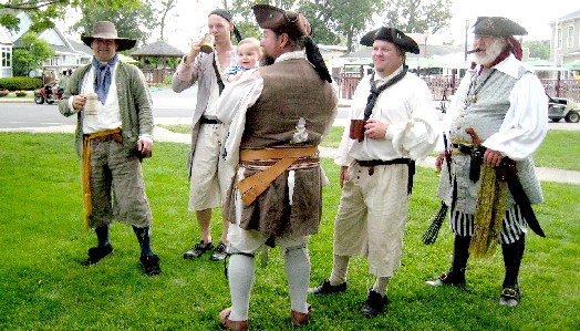 The pirates hanging around with M.A. d'Dogge and the baby