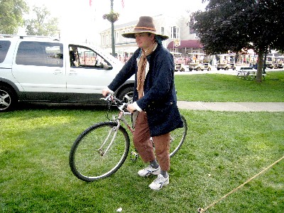 Mission in garb with his bike