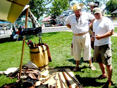 Dan presenting weapons and such