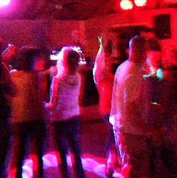 Bachelorettes dancing with colored lights